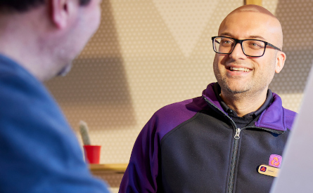 Branch colleague smiling at a customer